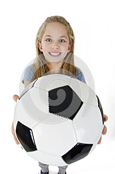 Adorable little girl with the soccer ball. Isolated on white background.