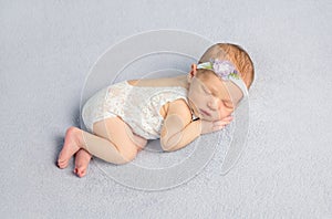 Adorable newborn baby in bodysuit