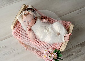 Adorable newborn baby girl portrait