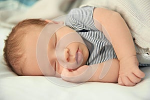 Adorable newborn baby peacefully sleeping