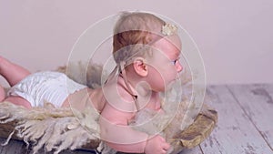 Adorable newborn baby in retro style