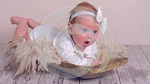 Adorable newborn baby in retro style