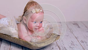Adorable newborn baby in retro style