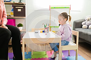 Adorable preschooler with bad behavior during time-out