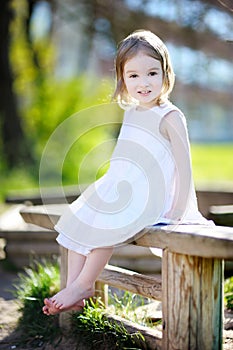 Adorable preschooler girl portrait outdoors