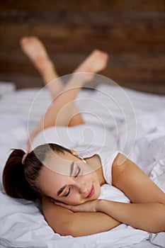 Adorable pretty woman lie on bed, relax