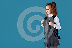 adorable schoolgirl with backpack. Back to school