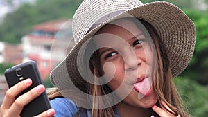 Adorable Teen Girl Making Selfies And Funny Faces