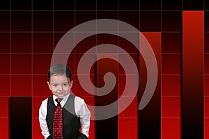 Adorable Toddler Boy In Suit Standing Against Bar Graph