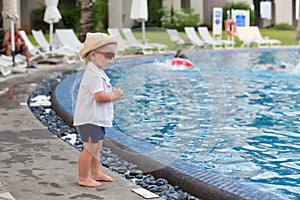 Adorable toddler boy in summer holiday resort in Mauritius, casually dressed