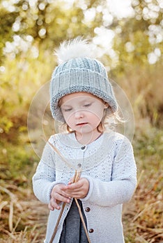 Adorable toddler girl portrait on beautiful autumn day