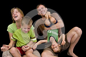 Adorable young family playing