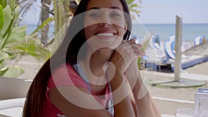 Adorable young woman near tropical beach