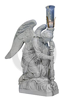 Adoring kneeling praying  angle statue with lamp isolated looking right photo