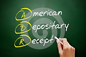 ADR - American Depositary Receipt acronym, business concept on blackboard