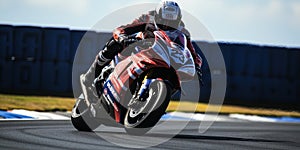 The Adrenaline of MotoGP Racing A Rider and Motorcycle Pushing the Limits photo