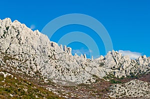 Adriatic coastal region in Dalmatia, Croatia with white, rocky m
