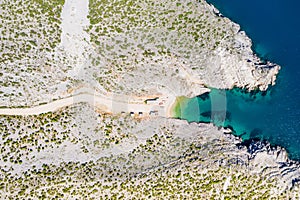 Adriatic sea coastline in Croatia, beautiful secret beach near town of Vrsi among stone cliffs