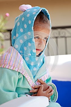 Adroable young child in bathrobe