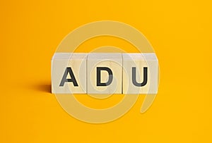 adu , questions and answers on wooden cubes. Concept photo