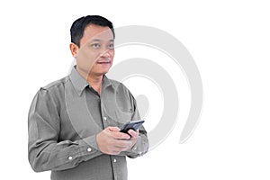 Adult Asian business middle age man is holding smartphone mobile phone in his hand isolated on white background