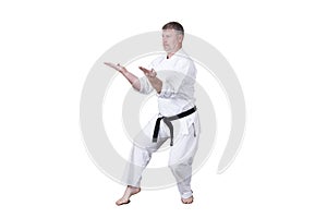 Adult athlete performs formal goju-ryu exercises