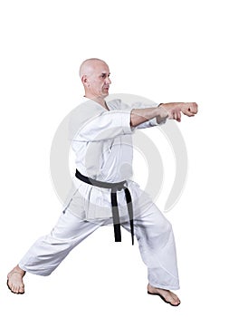 Adult athlete performs formal goju-ryu exercises