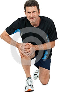 Adult attractive man in sportswear knee pain injury ache isolated