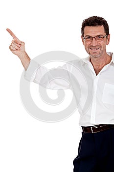 Adult attractive smiling man pointing his finger on the copyspace