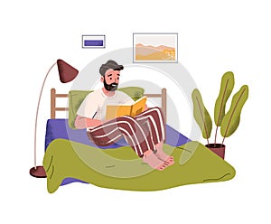 Adult bearded man reads book in bed. Reader relaxes indoor. Person holds storybook in hands, gets pleasants from stories