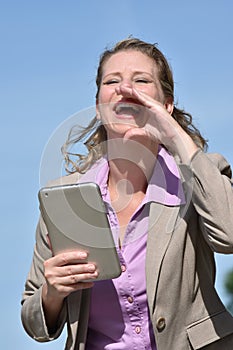 Adult Blonde Business Woman Yelling With Tablet