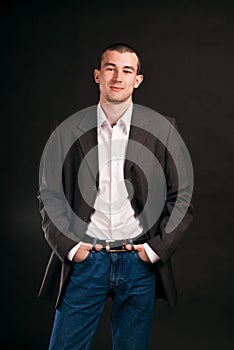 Adult businessman on a black background