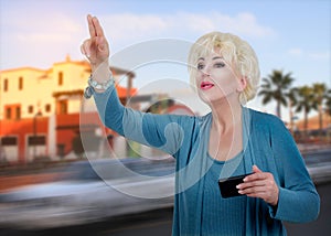Adult businesswoman catching taxi