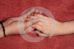 adult and child hands holding, love concept, family love with copy space