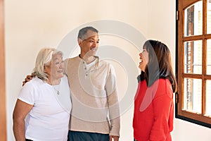 Adult children pay a visit to their Japanese-born mother, embodying the idea of a joyous family