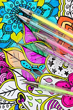 Adult coloring book, new stress relieving trend. Art therapy, mental health, creativity and mindfulness concept.