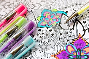 Adult coloring book, new stress relieving trend. Art therapy, mental health, creativity and mindfulness concept. Adult coloring.