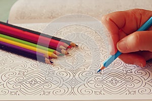 Adult coloring book trend, for stress relief. top view.