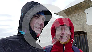 Adult Couple Resist Hurricane Winds