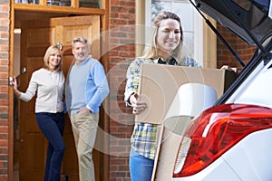Adult Daughter Moving Out Of Parent's Home photo