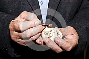 Adult decorating easter egg