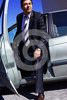 Adult, elderly, solid, a man gets out of the car