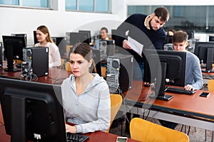 Adult female student works at computer