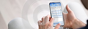 Adult Filling Online Survey Rating Questionnaire