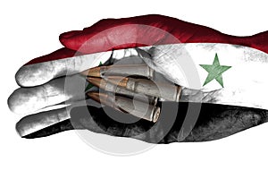 Adult hand with Iraq flag overlaid holding bullets. Isolated on white
