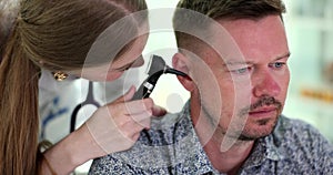 Adult hearing test and otoscopy