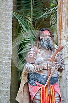 Adult Indigenous Australian.Man Holding Boomerangs