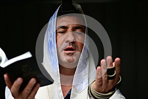 Adult Jewish man paying morning pray