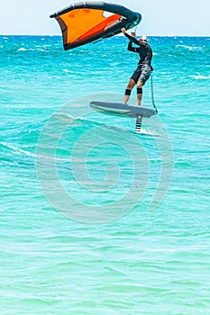 Adult male, wind surfing, in Mediteranian sea