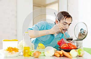 Adult man doing veggy lunch